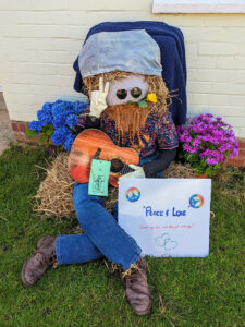 Oving Scarecrow Day 2022 peace and love